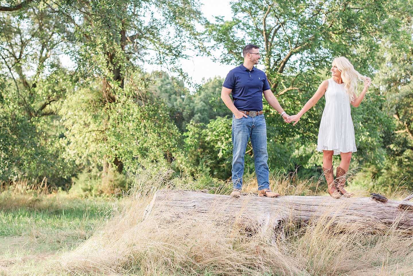 couples engagement portrait in countryside fountain inn